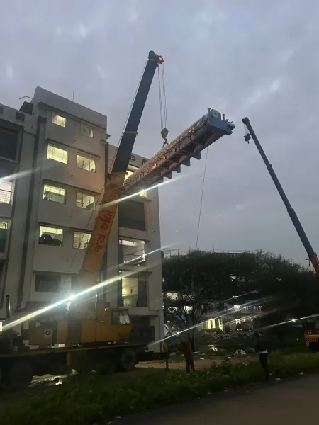 Lifting a machine to an upper floor