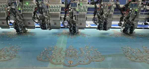 Multi-head embroidery in production