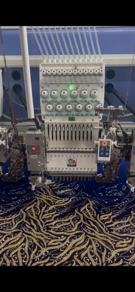 An embroidery head at work